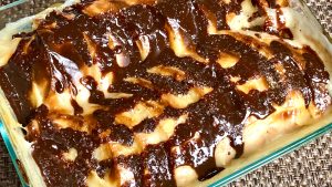 Bread Pudding with Chocolate Sauce Recipe by Manjula