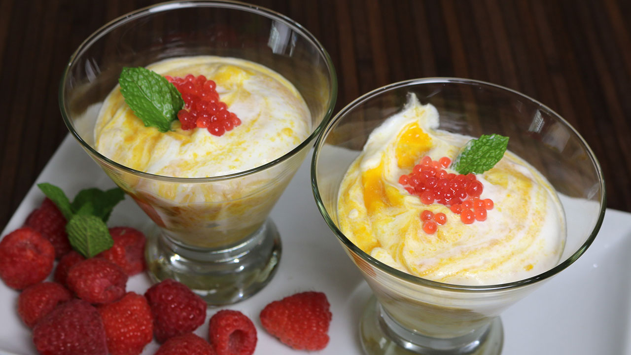 Mango Mousse with Raspberry Pearls